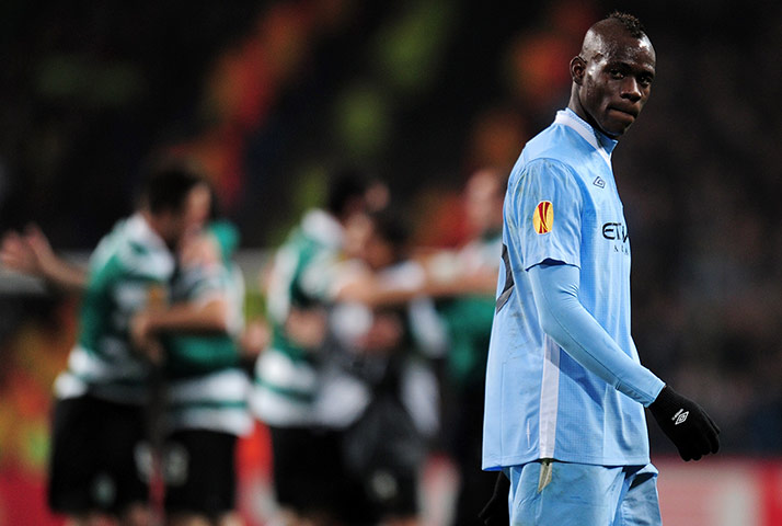 City v Sporting: Dejected Mario Balotelli after the match against Sporting Lisbon