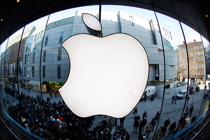 New iPad goes on sale: Munich, Germany: People wait in front of an Apple store