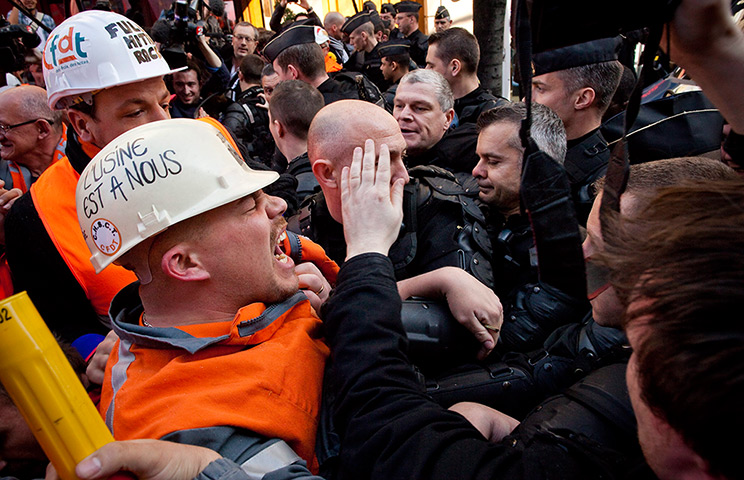 24 hours in pictures: Paris, France: Workers from steel-work company ArcelorMittal
