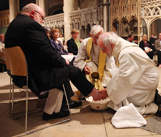Dr Rowan Williams: The Archbishop of Canterbury performing the Washing of The Feet ceremony