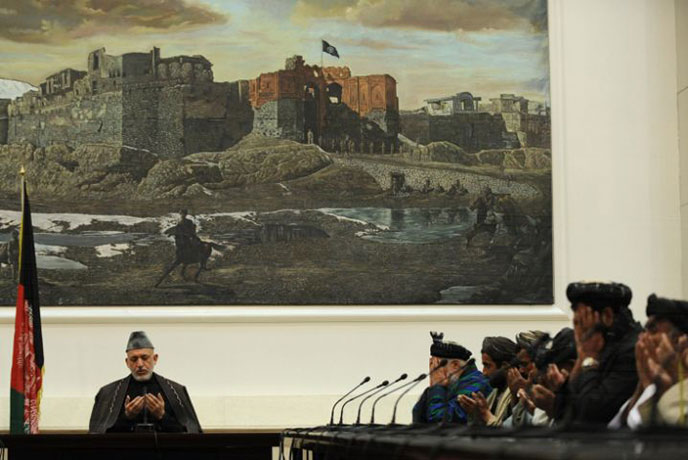 Robert Bales gallery: Hamid Karzai, the Afghan president, prays with family members and leaders