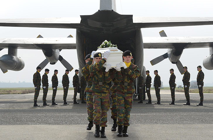 24 hours: coffins being offloaded from a plane