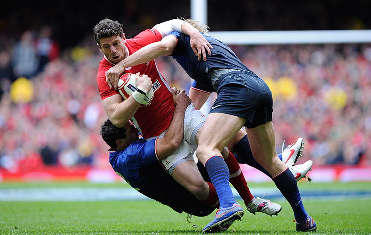 Wales v France: Alex Cuthbert tackled by Fritz and Rougerie