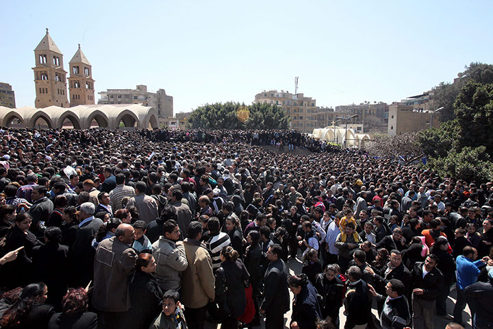 Pope Shenouda III: Thousands of tearful Christians attended a mass service in Cairo