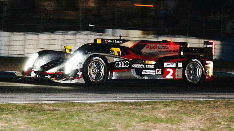 12 hours of Sebring : Audi's winning No2 car hurtles towards the chequered flag.