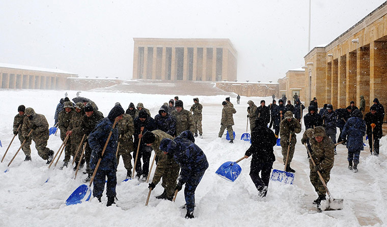 Snow: Soldiers clear snow before a ceremony at Anitkabir