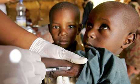 A young boy is vacinated 