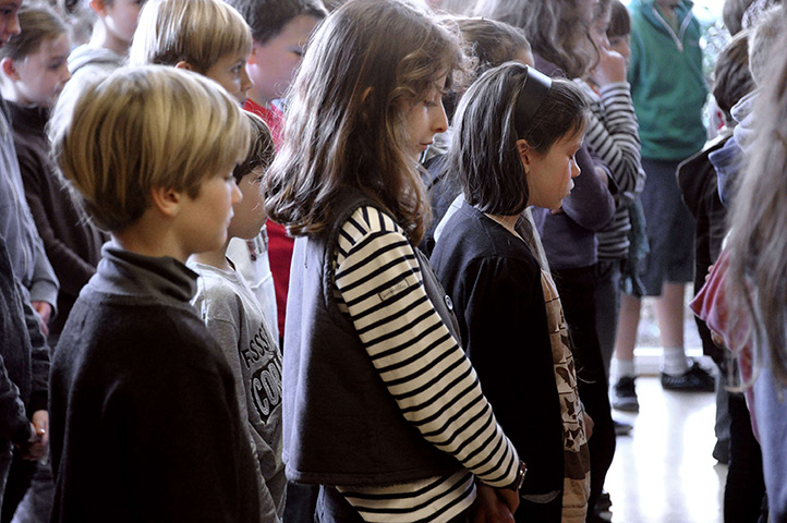 Toulouse shooting: Children pay their respects in their school in Rennes
