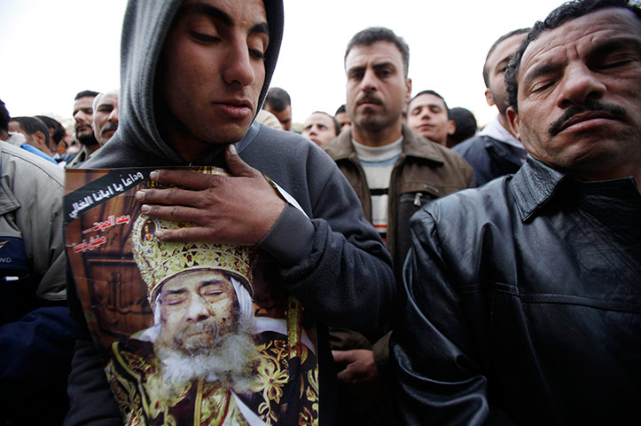 Pope Shenouda Funeral: Egyptian Christians mourn during the funeral of Pope Shenouda