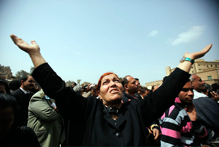 Pope Shenouda Funeral: A woman mourns for Coptic Pope Shenouda In Cairo