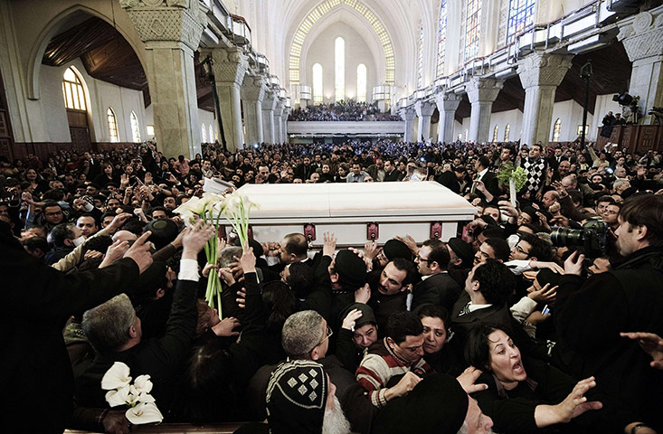 Pope Shenouda Funeral: Pallbearers carry the coffin of Coptic Pope Shenuda III