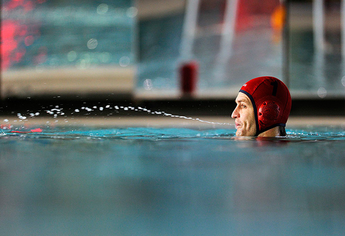 24 hours in pictures: Robin Randall spits out water during the Canadian men's water polo team