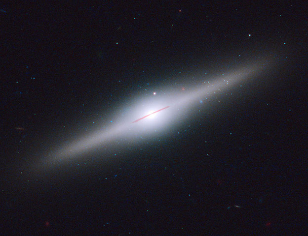 Month in space: NASA's Hubble Spots a Relic from a Shredded Galaxy