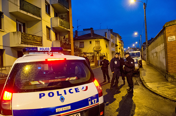 Toulouse siege: Police surround a property during an operation to arrest Mohammed Merah