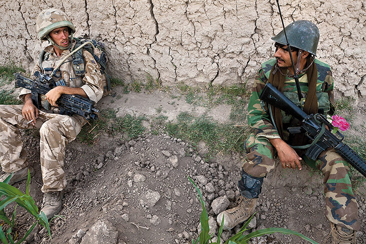 Sean Smith open weekend: British soldier from the the Mercian Regiment mentoring an Afghan soldier