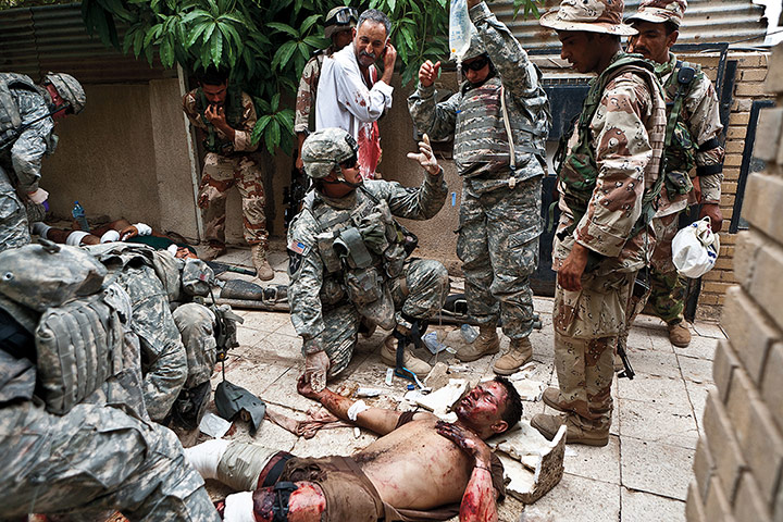 Sean Smith open weekend: Iraqi civilians injured by an explosion at a bomb factory