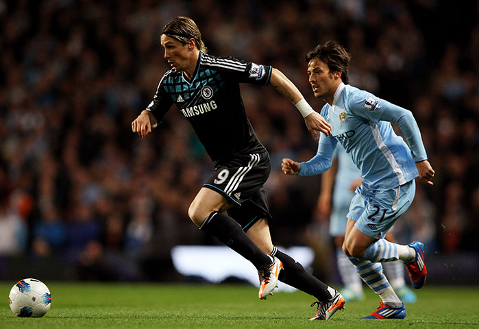 Manchester City v Chelsea: Fernando Torres is pursued by David Silva