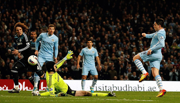 City v Chelsea: Manchester City's Samir Nasri scores past Chelsea's goalkeeper Petr Cech