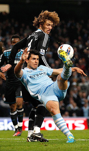 City v Chelsea: A high-kicking Sergio Aguero battles with Chelsea's David Luiz