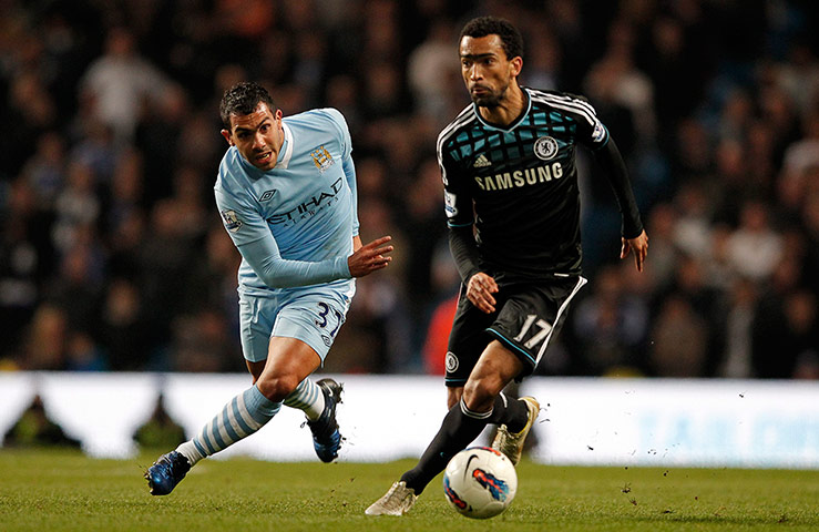 City v Chelsea: Manchester City's Carlos Tevez vies  with Chelsea's Jose Bosingwa 