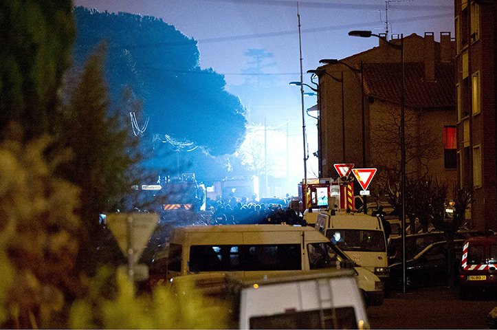 Toulouse seige: Special police RAID units surround the building where gunman Mohamed Merah 