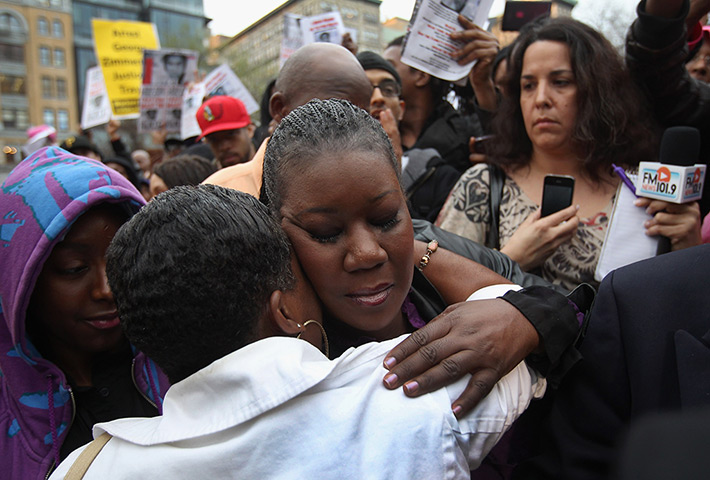 Trayvon Martin march: Sybrina Fulton, mother of slain teenager Trayvon Martin, hugs a supporter