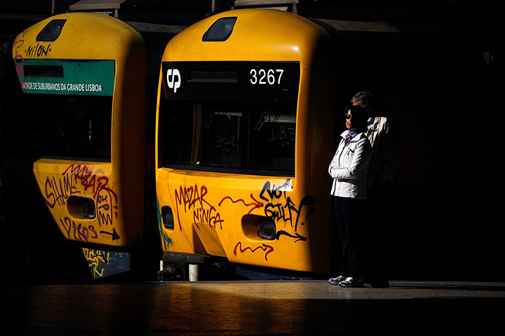 24 hours: Lisbon, Portugal: People wait for a train during the general strike