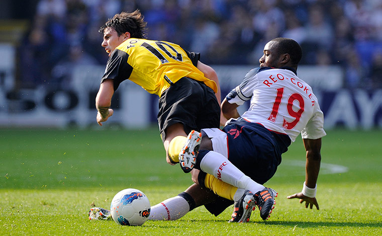 Bolton versus Blackburn: Bolton's Nigel Reo-Coker goes in hard on Blackburn's Mauro Formica