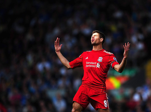 Saturday round-up: Steven Gerrard of Liverpool shows his frustrations against Wigan Athletic