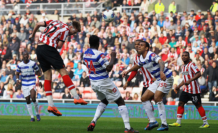 Saturday round-up: Nicklas Bendtner of Sunderland scores a goal from a header against QPR