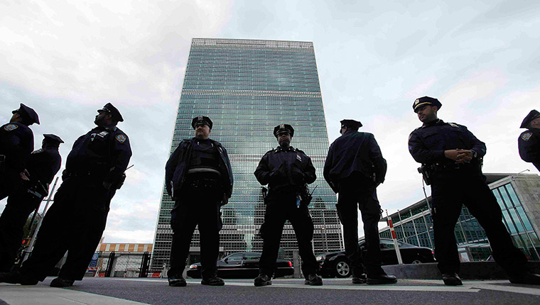 Occupy Wall Street march: Police stand guard in front of the UN