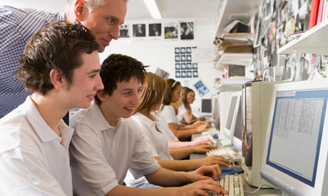 Teenagers at a computer