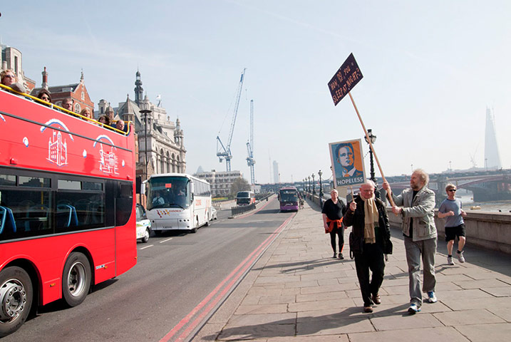 Placard gallery: Banner-maker Ed Hall (left) and artist Svein Moxvold 