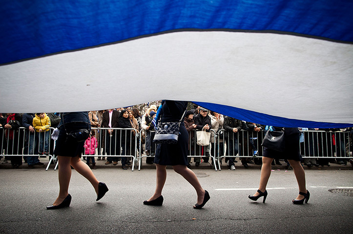 24 hours in pictures: New York, US: Women participe in the annual Greek Independence Day Parade