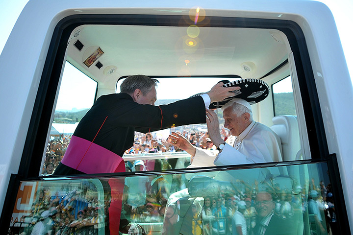 24 hours in pictures: Silao, Mexico: Pope Benedict XVI wears a typical Mexican hat