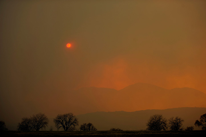 24 hours in pictures: Roxborough State Park, US: Thick smoke covers the sky