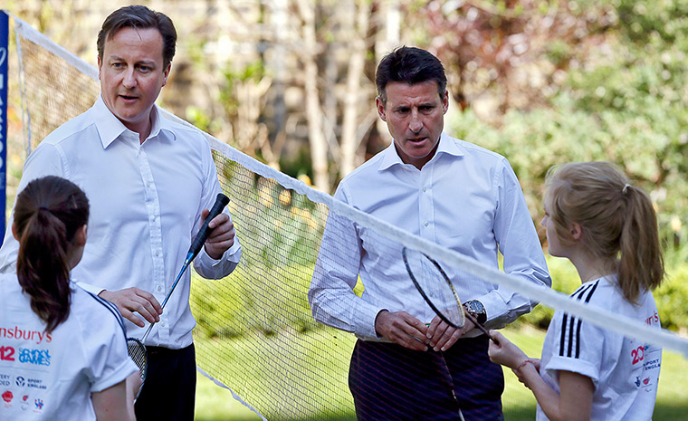 David Cameron badminton: David Cameron and LOCOG President Sebastian Coe with young athletes