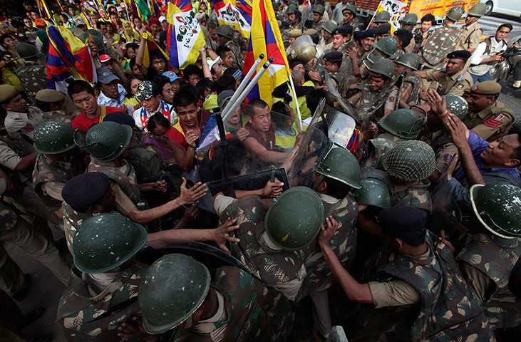 Tibet Protests: Tibetan exiles scuffle with the police during a protest
