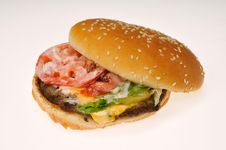 Hoaxes: Burger King Whopper Cheeseburger with tomato lettuce and mayonnaise on bun