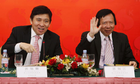 The Kwok brothers, Thomas (right) and Raymond, have been arrested on suspicion of corruption