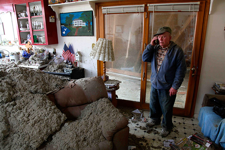Tornado Updated: A man in his house after a tornado tore the roof off his home in Tennessee