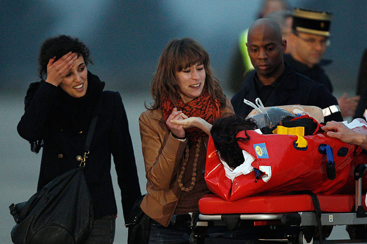 24 Hours: Journalist Edith Bouvier, injured in Homs, arrives in Paris