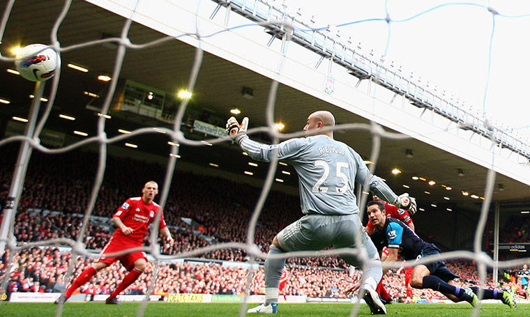 Liverpool v Arsenal: Arsenal's Robin Van Persie scores against Liverpool 