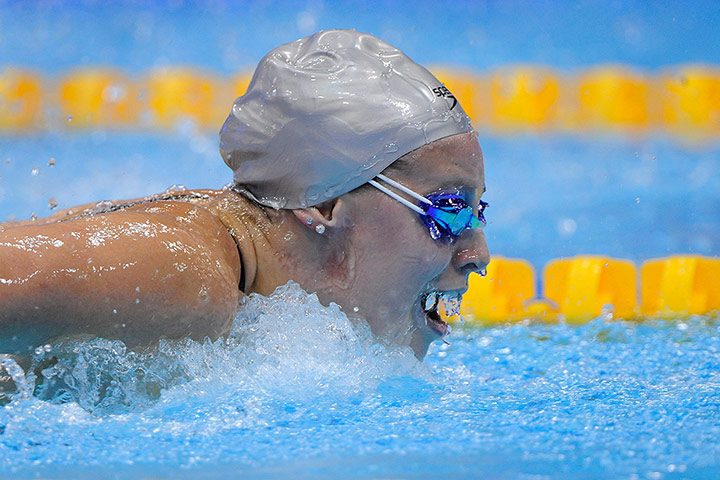 Swimming part 3: Ellen Gandy wins her semi-final of the womens 100m butterfly