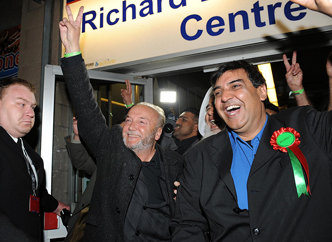 George Galloway win: George Galloway celebrates with his election agent Arshad Ali 