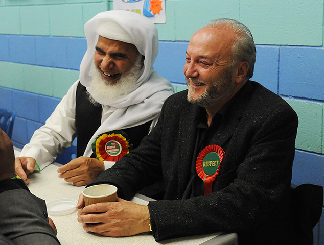 George Galloway win: George Galloway sits with his supporter Mohammed Iqbal