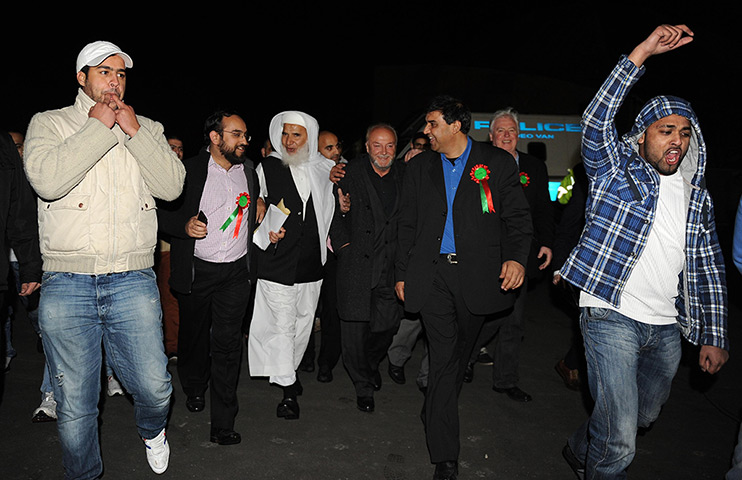 George Galloway win: George Galloway celebrates with his supporters after winning