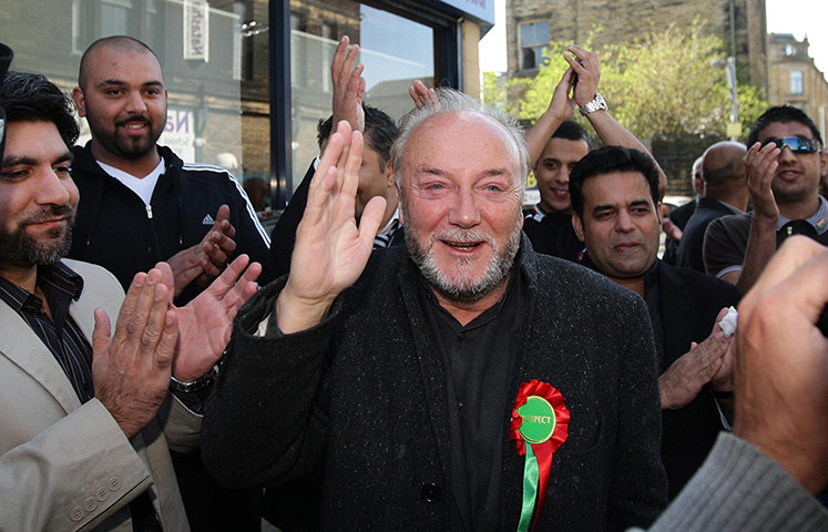 George Galloway Wins: Galloway waves to supporters before an open top bus tour in Bradford