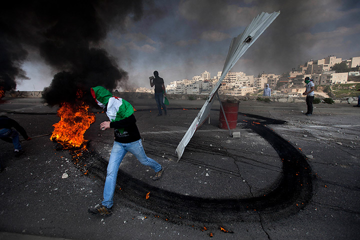 Land Day protests: Masked Palestinians clash with Israeli troops