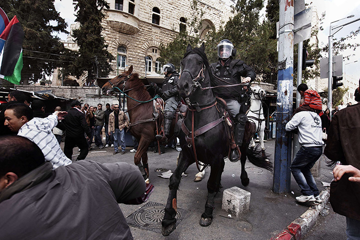 Land Day protests: Israeli mounted policeman disperse hundreds of Palestinian protesters